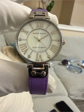 Anne Klein Women's Watch AK/1269 Silver Tone MOP Dial Purple Leather Strap